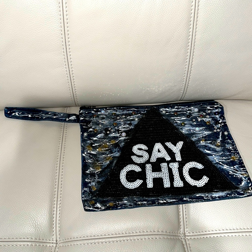 Clutch painted handbag